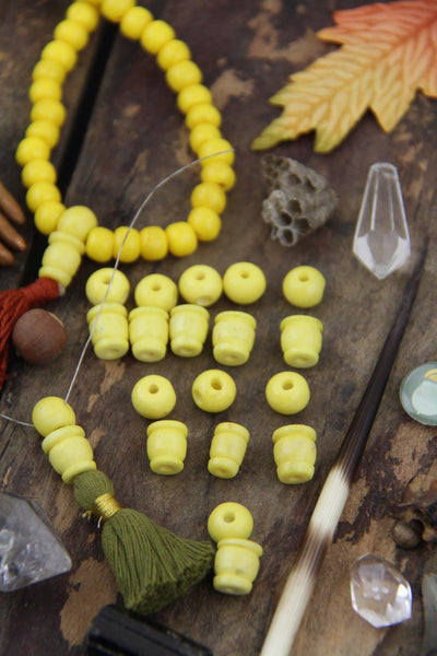 Yellow Bone Guru Beads, 8mm, 3 sets (6 beads) - ShopWomanShopsWorld.com. Bone Beads, Tassels, Pom Poms, African Beads.