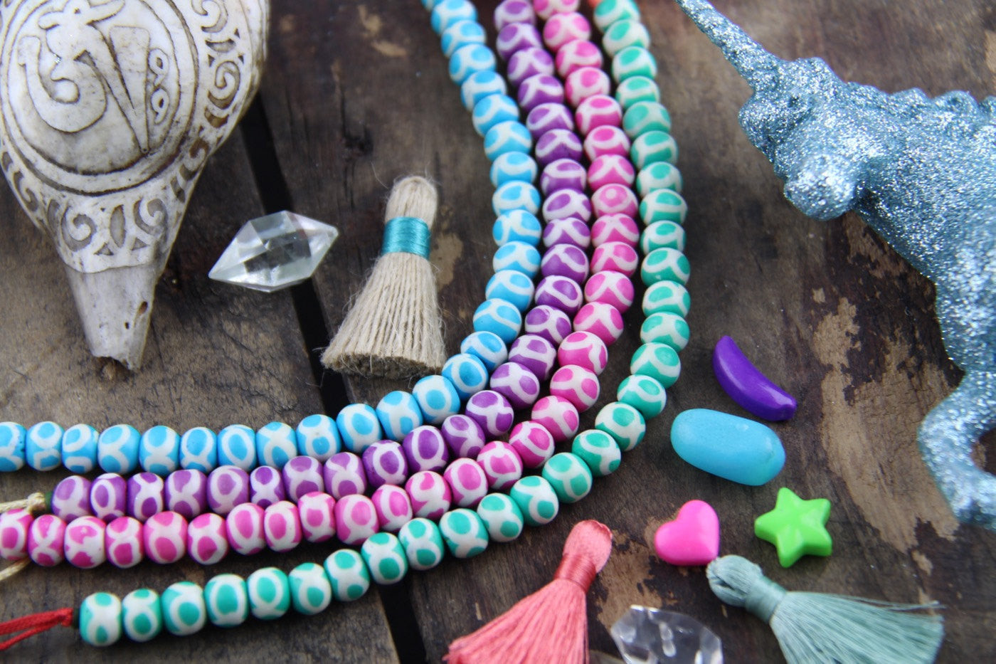 Infinity Circles Pastel Bone Beads, 6x8mm, 31 pieces - ShopWomanShopsWorld.com. Bone Beads, Tassels, Pom Poms, African Beads.
