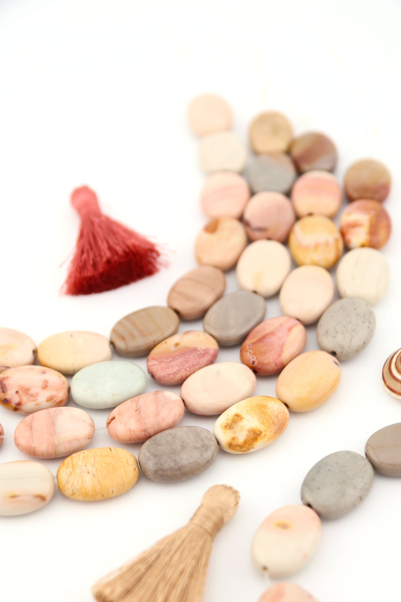 Natural Imperial Jasper Oval Beads, 13x18mm, High Polished Desert Colors, in natural shades of pink, cream, gray, tan, and sage.