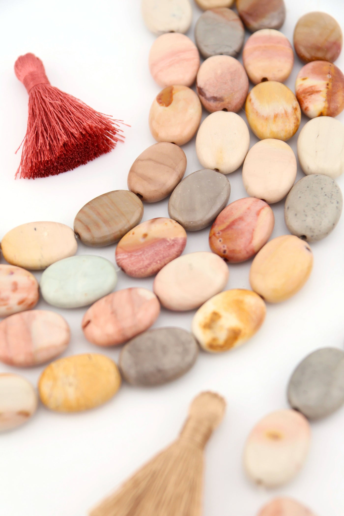 Natural Imperial Jasper Oval Beads, 13x18mm, High Polished Desert Colors, in natural shades of pink, cream, gray, tan, and sage.