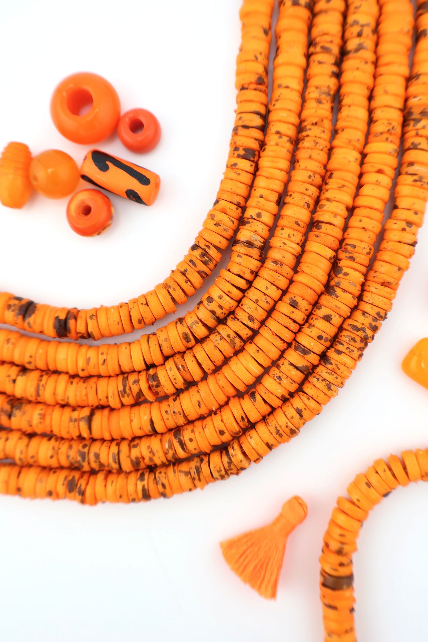 7mm Heishi Orange Speckled Bone Beads: Disc Spacers, 95 beads