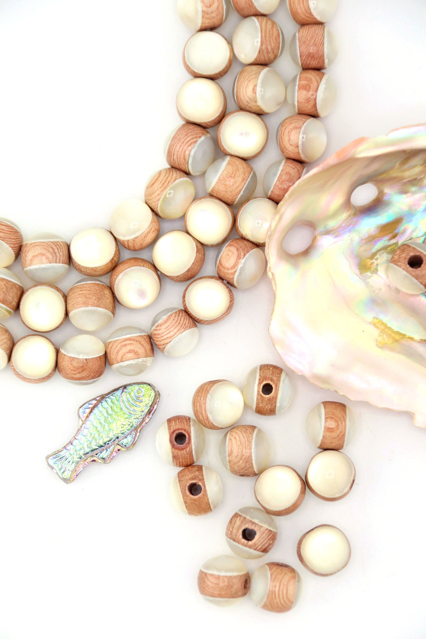 3 strands curved, along with loose iInlaid Rosewood & Mother of Pearl Round Beads, 9mm. 