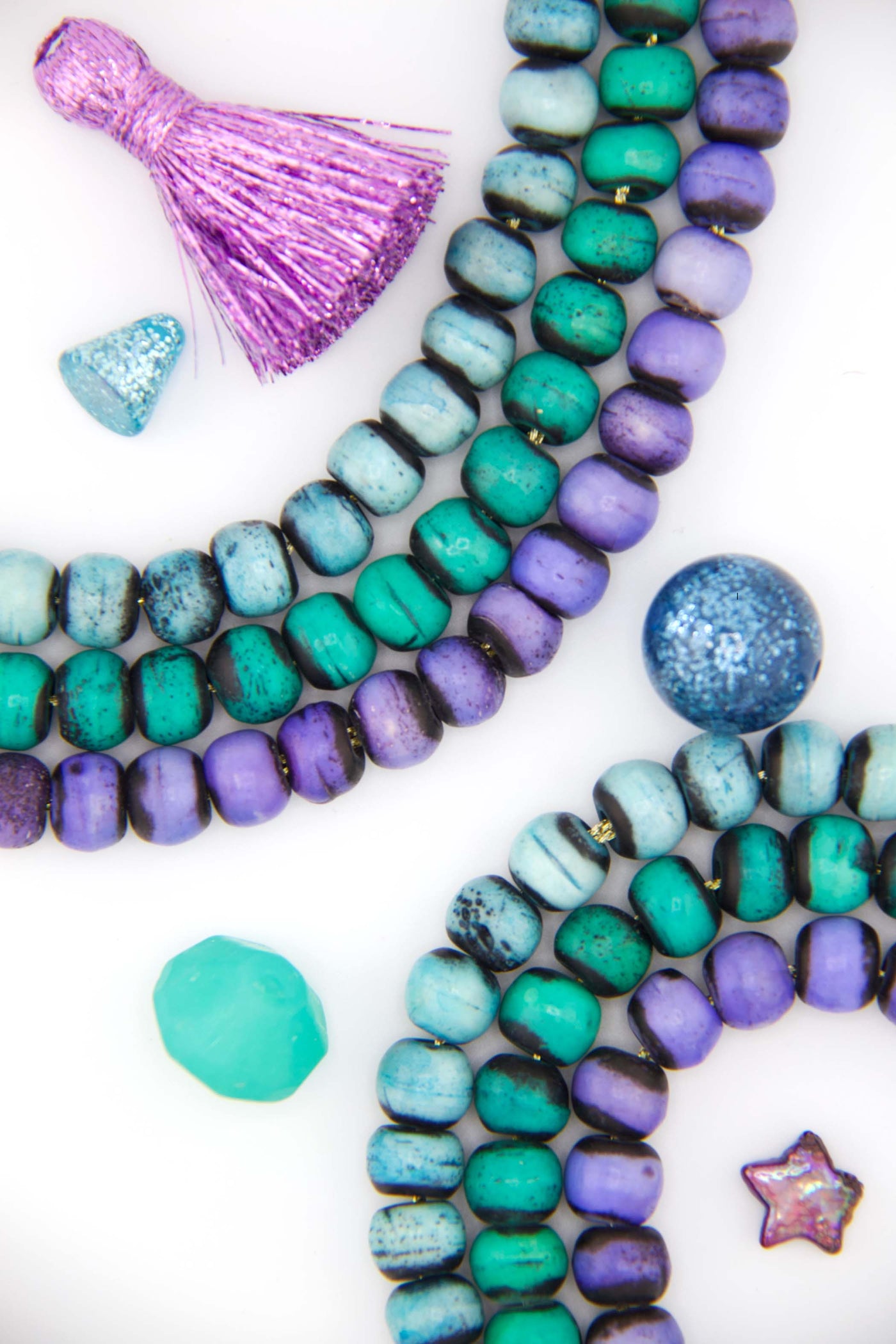 Aurora Borealis Beads: Aqua for the serene sky, Purple for the majestic night, & Turquoise for water
