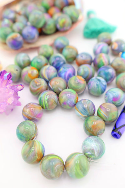 Aurora Flash Round German Resin Beads, 12mm, 10 pcs. These beads remind us of the northern lights