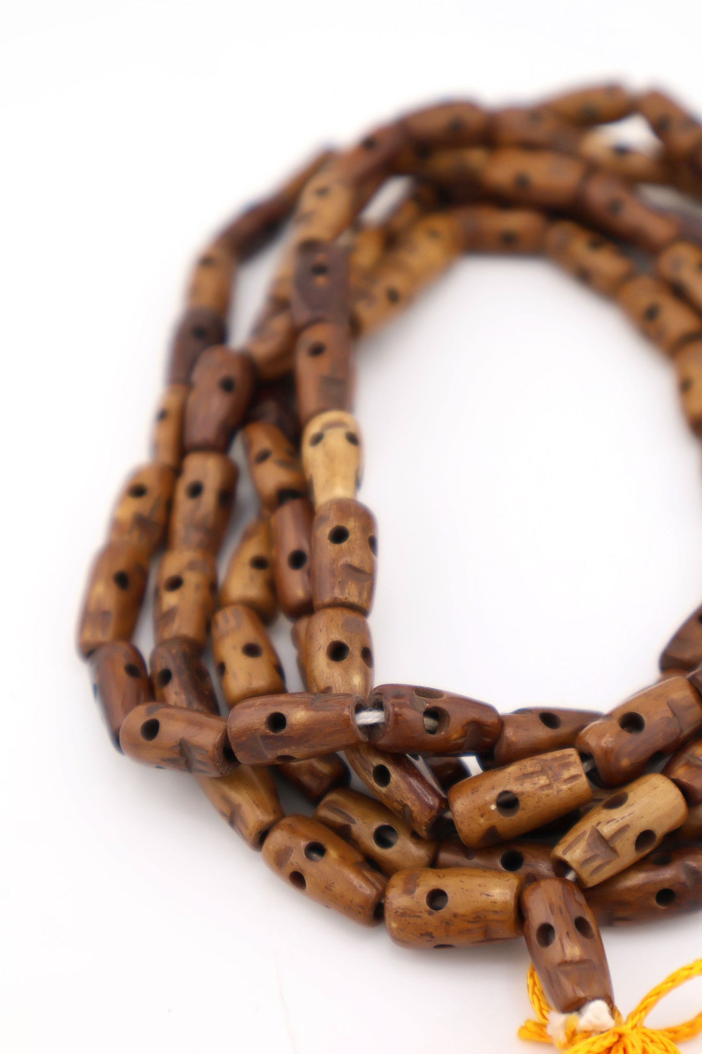 Brown Skull Bead Mala, 7x12mm, Skulls are revered & used in jewelry in cultures around the world.