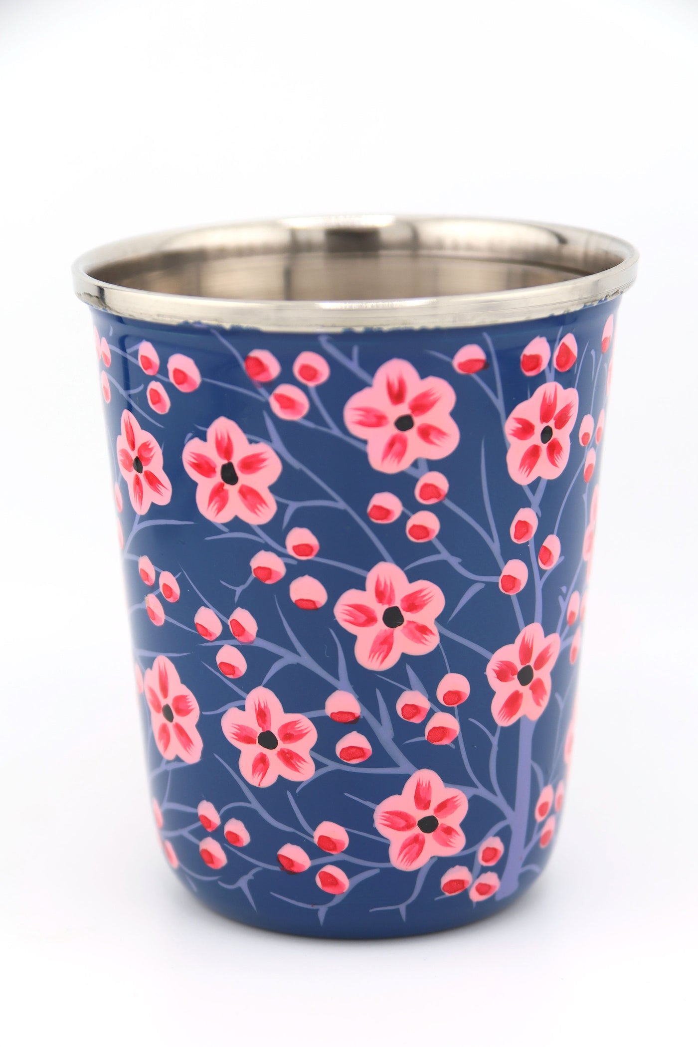 Sip in style with our picnic folk Small Enamel Tumbler, painted by hand by artisans in Kashmir