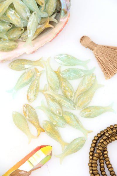 Golden Sage resin fish charms, 32x12mm. Soft sage green with golden shimmer, carved scale detail—perfect for DIY jewelry, earrings & mermaid-core designs.