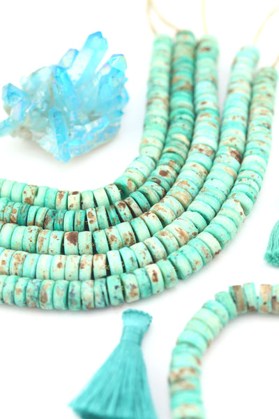 10mm Turquoise Speckled Disc Beads: Hand Carved Heishi Discs, 50 Beads, for DIY jewelry these mint disc beads are a versatile choice for fall-inspired designs. 