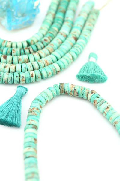 10mm Turquoise Speckled Disc Beads: Hand Carved Heishi Discs, 50 Beads, for DIY jewelry these mint disc beads are a versatile choice for fall-inspired designs. 