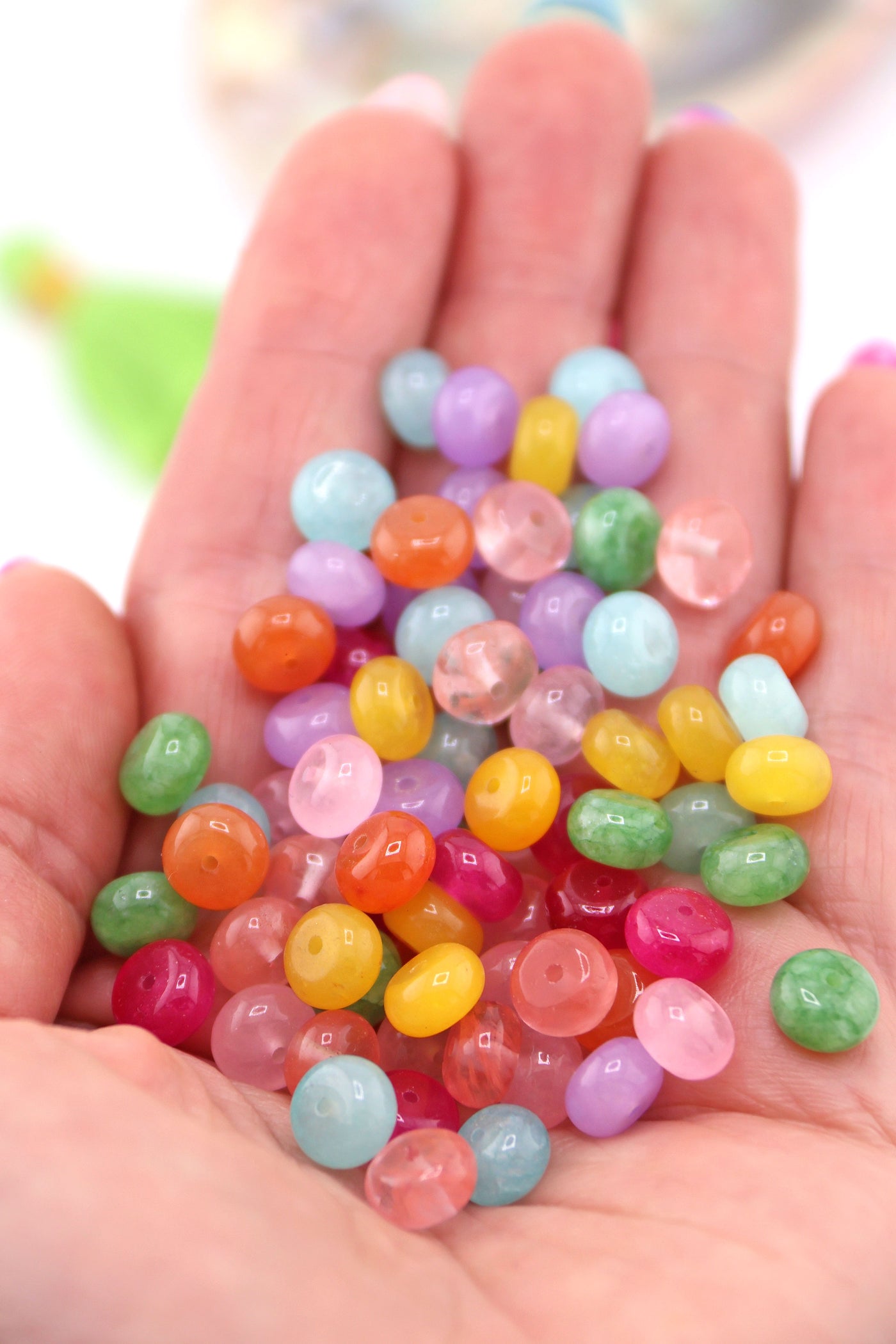 Pastel Rainbow Gemstone Beads, Loose Beads for DIY Necklace, shown in the palm of a hand