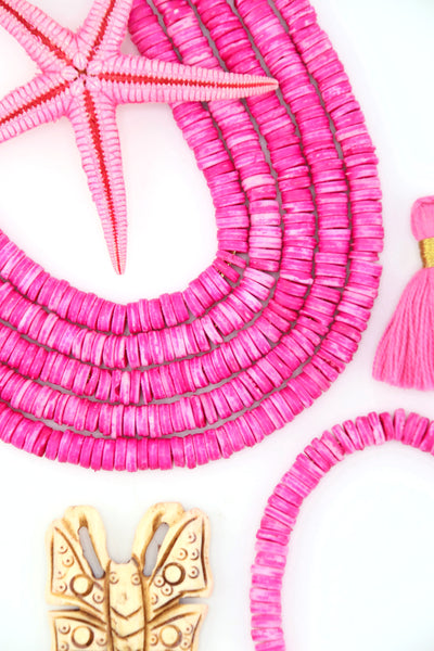 Bright Pink Bone Heishi Disc Beads, 7mm, 100+ beads  draped in an arc with a butterfly pendant and a starfish