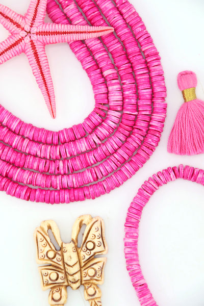 Bright Pink Bone Heishi Disc Beads, 7mm, 100+ beads  draped in an arc with a butterfly pendant and a starfish