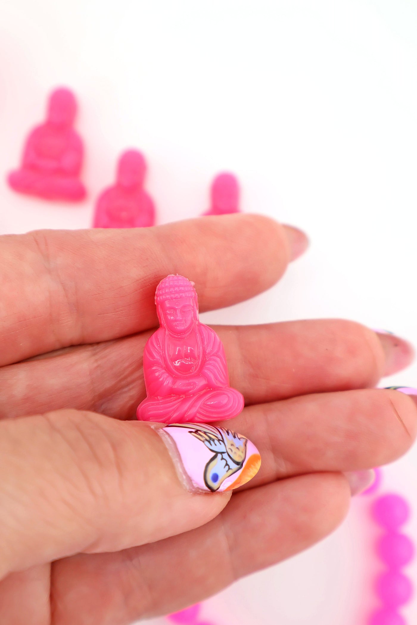 Neon Pink German Resin Buddha Charms from Ava Motherwell Collection, for making DIY Jewelry