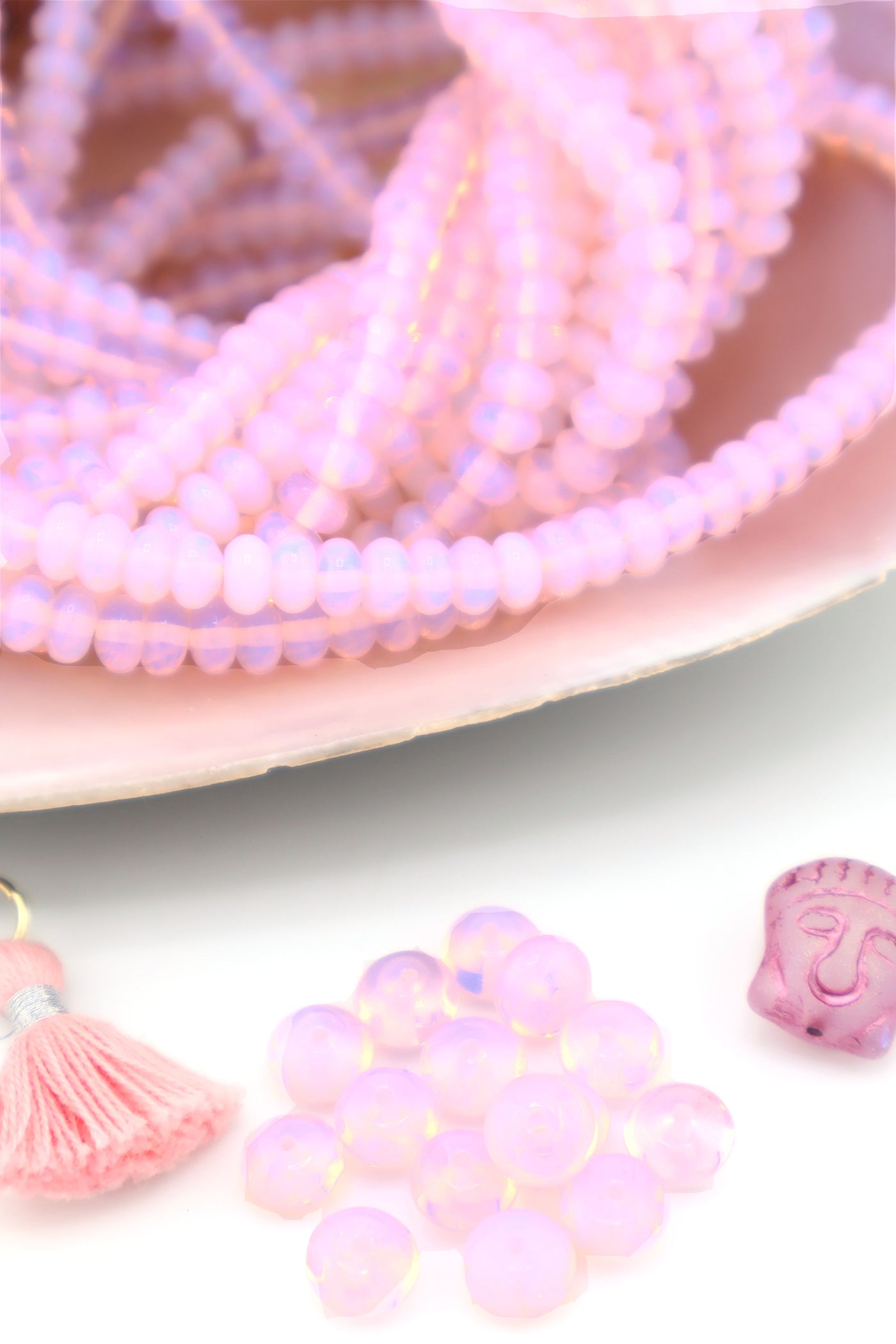The galaxy-like pastel pink in these jellyfish opalite beads is great for beginner DIY jewelry.