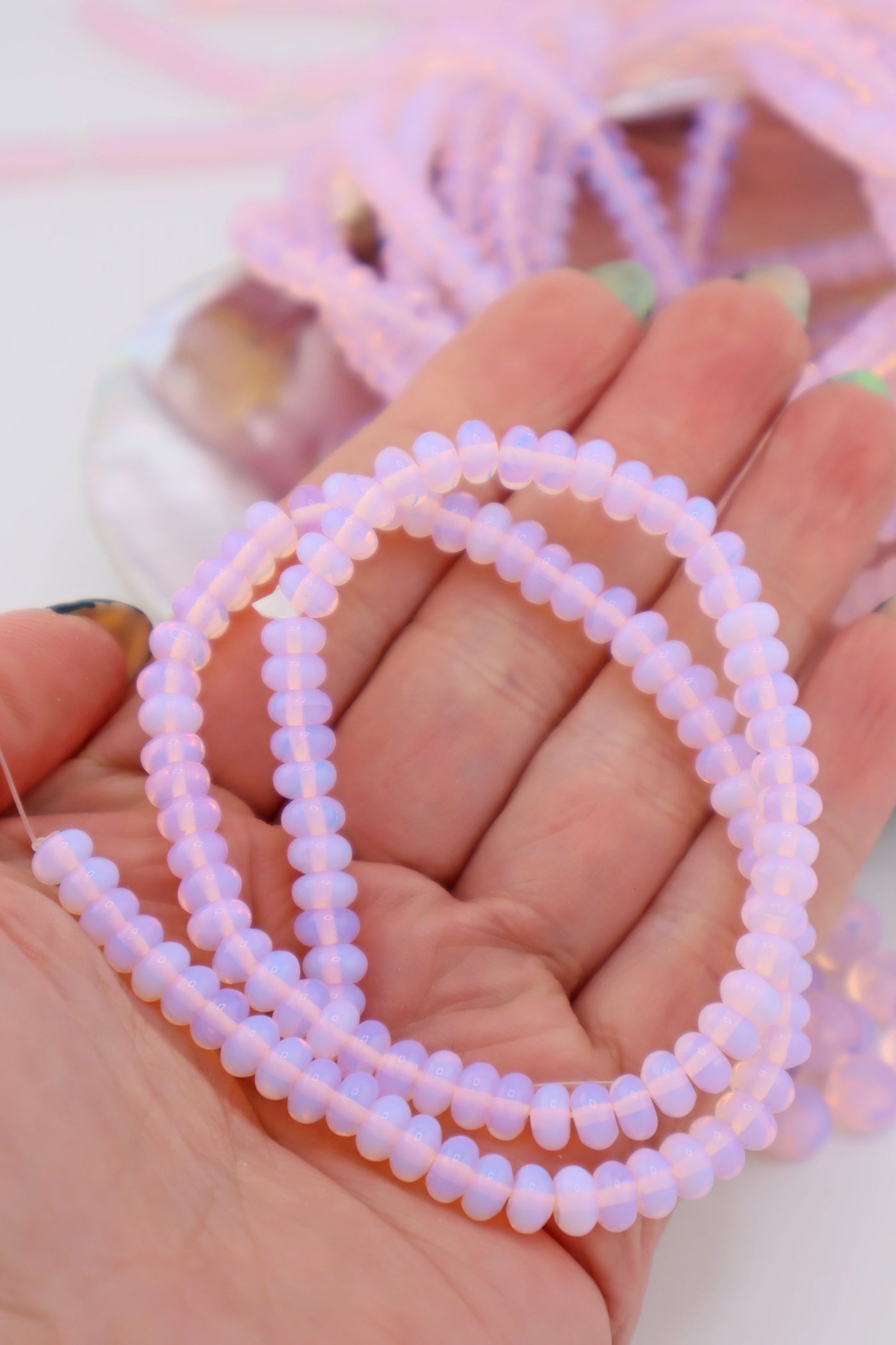 The pastel pink in these jellyfish opalite beads is great for jellyfish DIY aesthetic jewelry