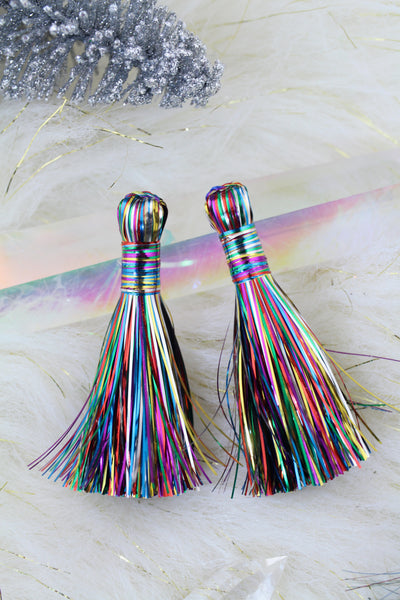 So sparkly and festive, these tassels are handcrafted from shimmering tinsel, in a rainbow of 