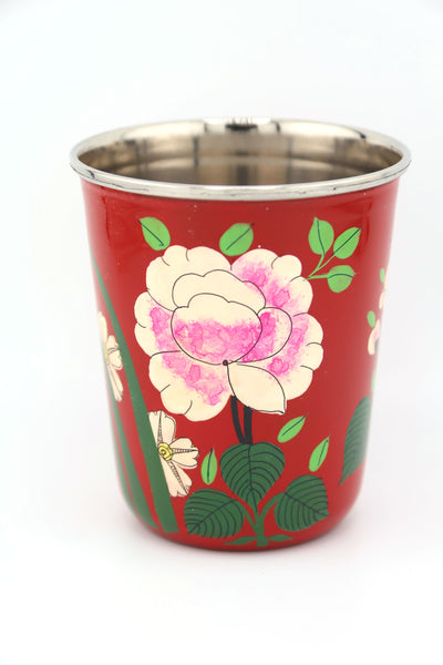 Sip in style with our picnic folk Small Enamel Tumbler, painted by hand by artisans in Kashmir