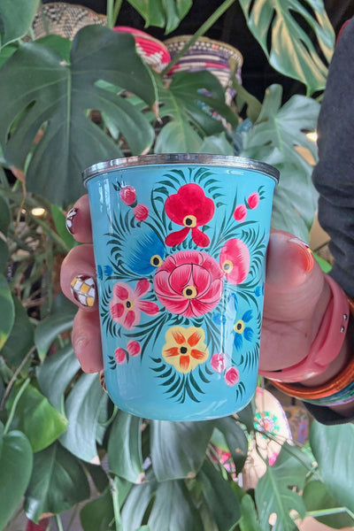 Sip in style with our picnic folk Small Enamel Tumbler, painted by hand by artisans in Kashmir