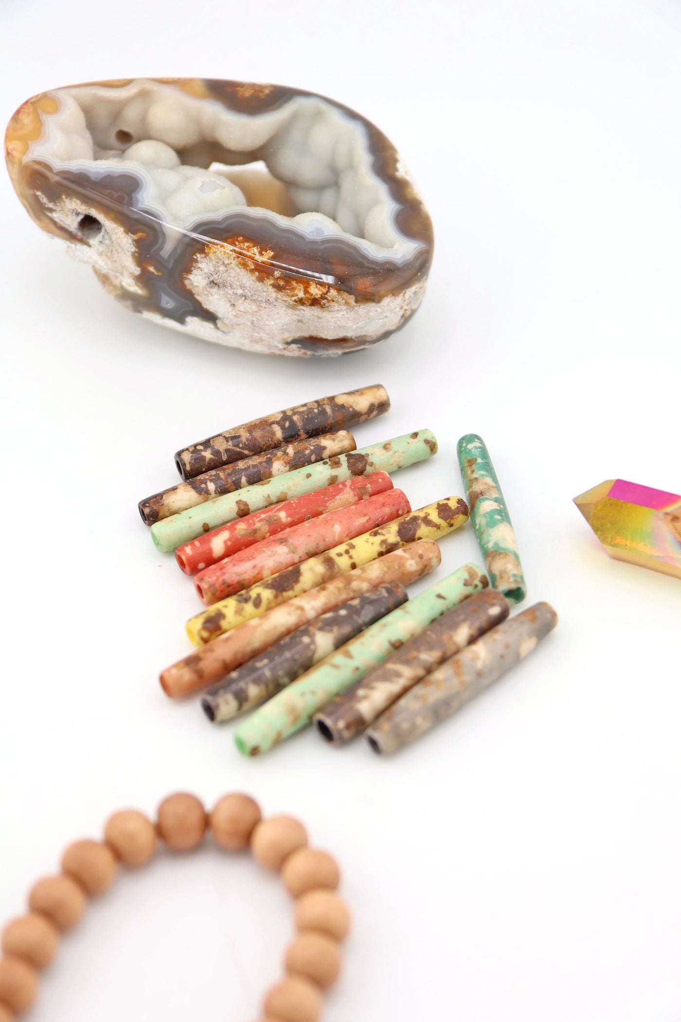 Hand-dyed speckled hairpipe bone beads in earthy mixed colors. 1.5” long, ethically sourced, artisan-made in India—perfect for boho jewelry