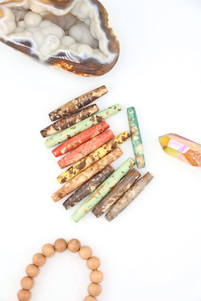 Hand-dyed speckled hairpipe bone beads in earthy mixed colors. 1.5” long, ethically sourced, artisan-made in India—perfect for boho jewelry