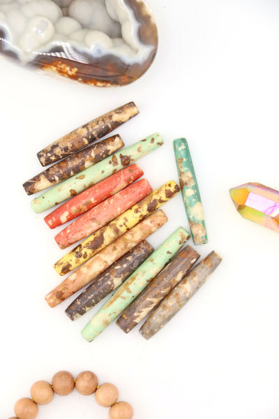 Hand-dyed speckled hairpipe bone beads in earthy mixed colors. 1.5” long, ethically sourced, artisan-made in India—perfect for boho jewelry