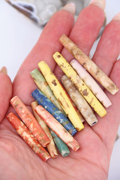 Hand-dyed speckled hairpipe bone beads in earthy mixed colors. 1.5” long, ethically sourced, artisan-made in India—perfect for boho jewelry