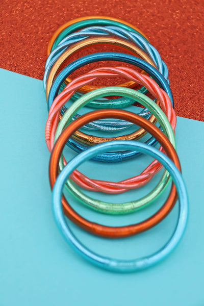 The Showgirl Bangle Stack, Thai Buddhist Temple Bracelets Set, Are you ready to enter your ✨SHOWGIRL✨ era?! Team WSW needed a bangle to take us to New Heights