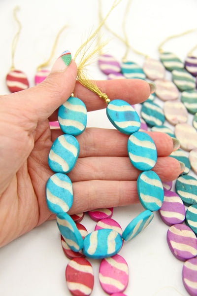 Reminiscent of Easter Eggs, these cute beads would make great accents in your DIY Jewelry 
