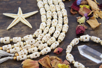Hand-Carved Skull Bone Beads: 9x15mm, Natural Cream Sugar Skulls