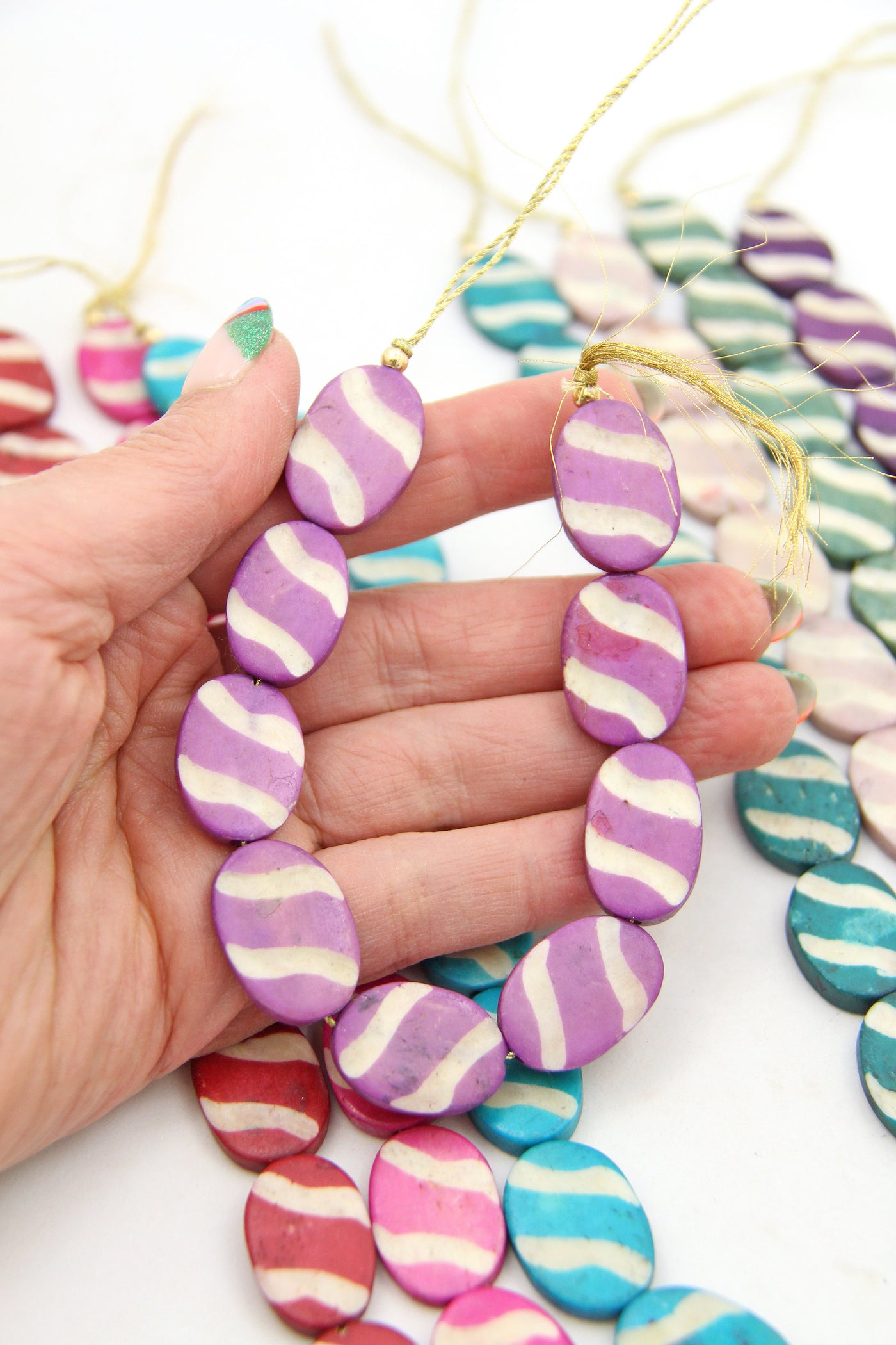 Reminiscent of Easter Eggs, these cute beads would make great accents in your Spring crafts