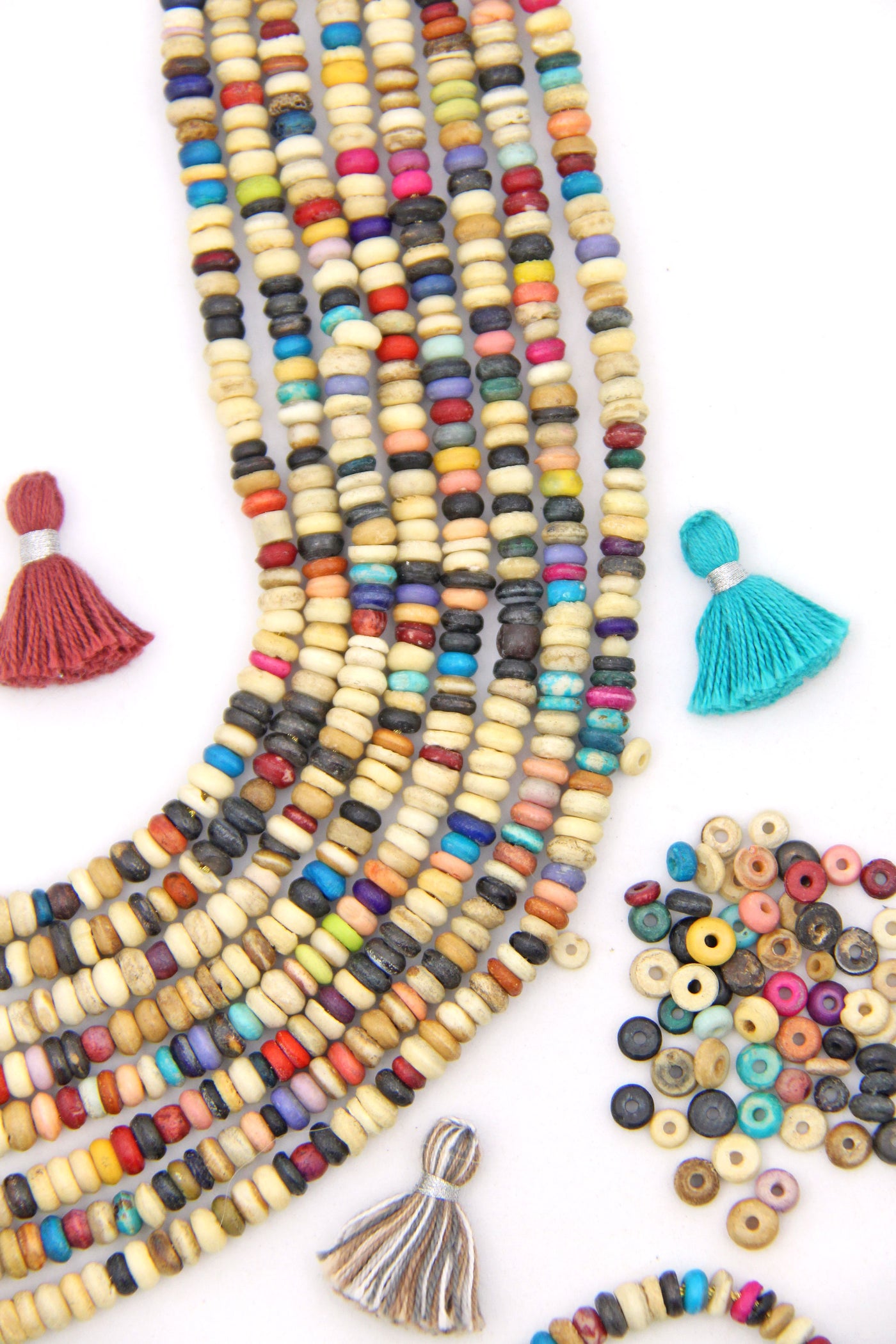 Tussy Mussy Heishi Natural Spacer Beads: 6x2mm Multi Colored Discs - ShopWomanShopsWorld.com for Artisan made DIY jewelry and craft supplies, natural beads, African Beads, tassels