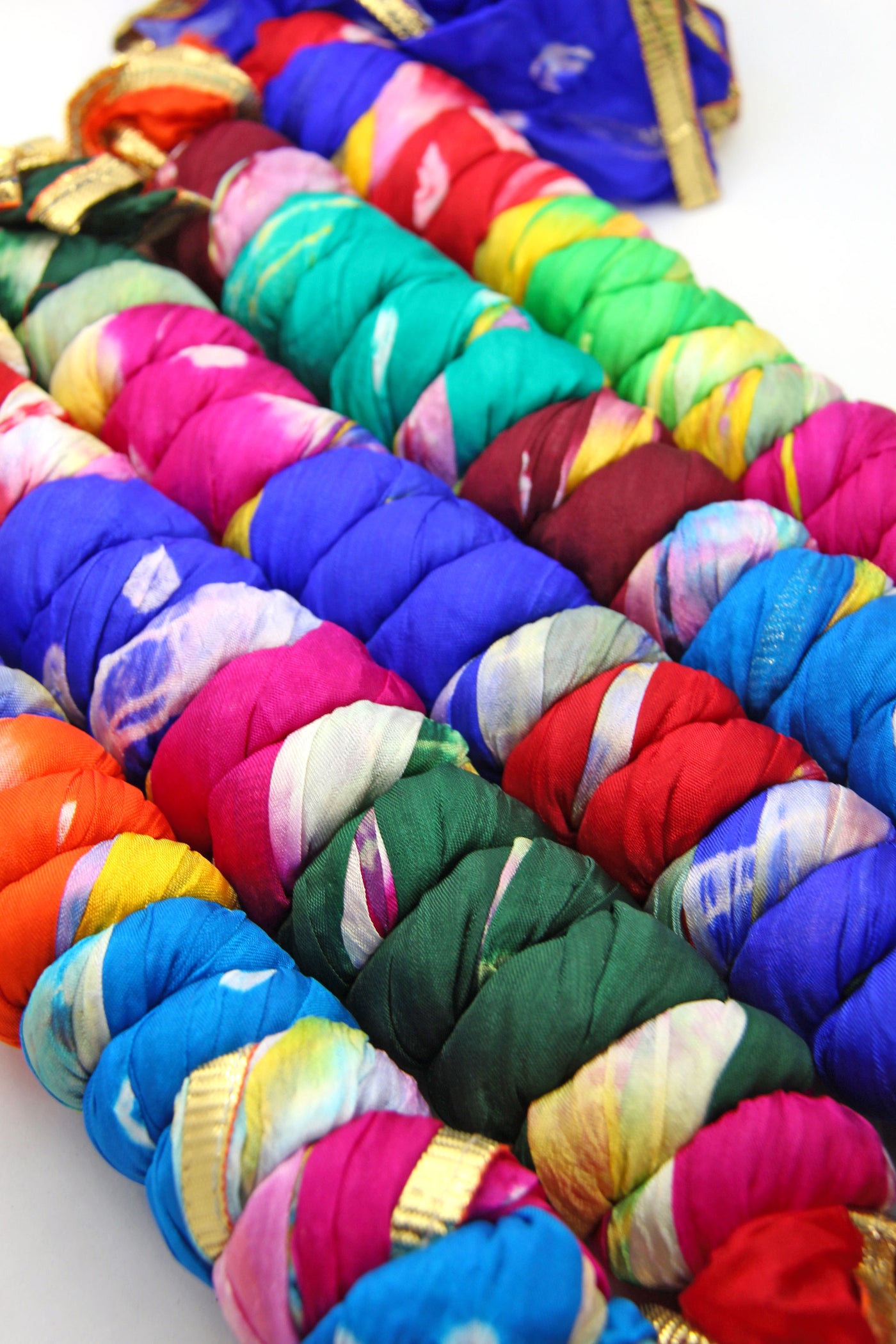 Wear your color boldly with these hand-dyed bandhani chiffon scarves.  