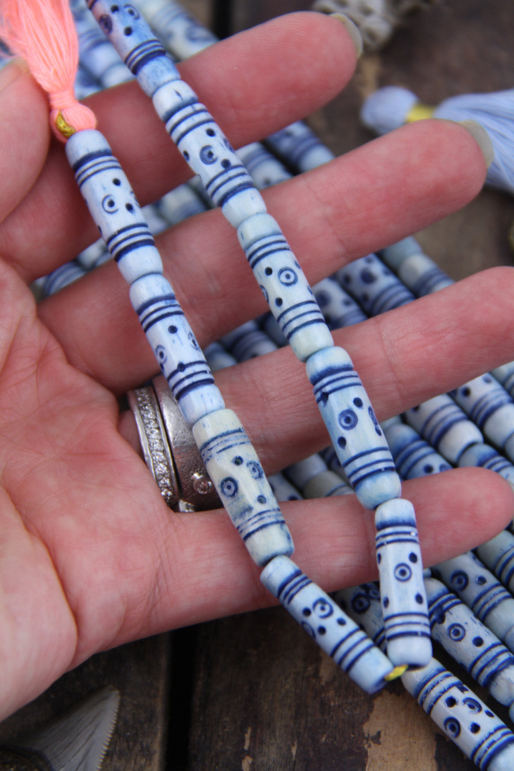 Denim Airy Blue Tribal Target Tube: Carved Bone Beads, 7x25mm, 9 pieces - ShopWomanShopsWorld.com. Bone Beads, Tassels, Pom Poms, African Beads.