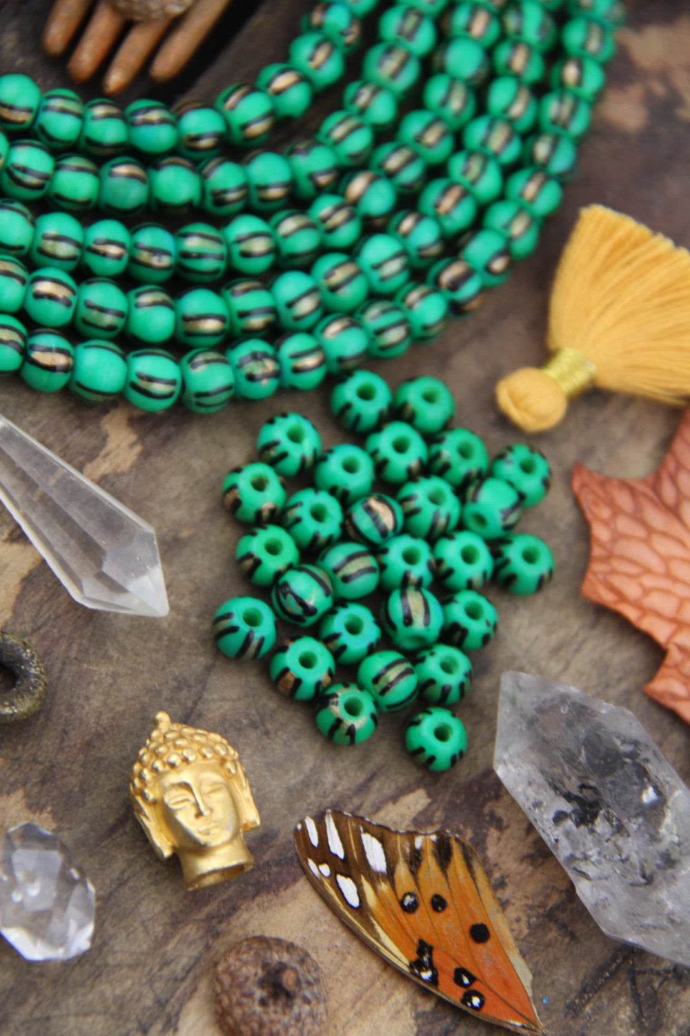 Golden Watermelon: Painted Green, Black & Gold Bone Beads, 6x8mm, 31 pieces - ShopWomanShopsWorld.com. Bone Beads, Tassels, Pom Poms, African Beads.