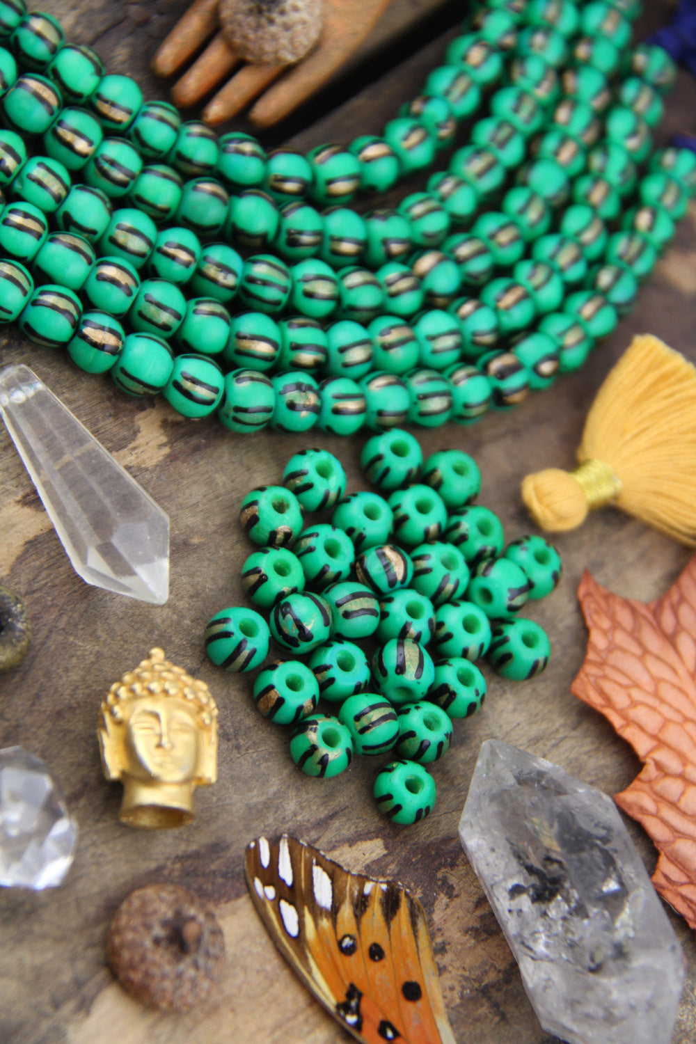 Golden Watermelon: Painted Green, Black & Gold Bone Beads, 6x8mm, 31 pieces - ShopWomanShopsWorld.com. Bone Beads, Tassels, Pom Poms, African Beads.