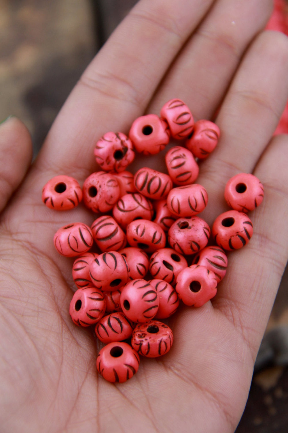 Grooved Salmon Tribal Loops: Carved Bone Beads, 9x7mm, 30 pieces - ShopWomanShopsWorld.com. Bone Beads, Tassels, Pom Poms, African Beads.