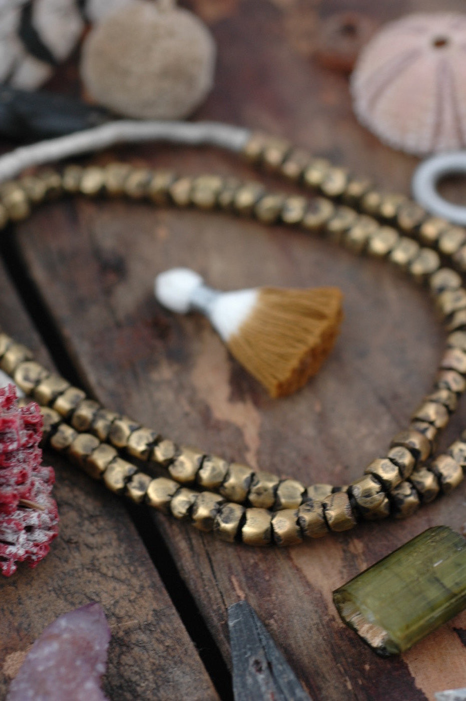African Brass Hex Nut Beads 6x5mm, 11" strand - ShopWomanShopsWorld.com. Bone Beads, Tassels, Pom Poms, African Beads.