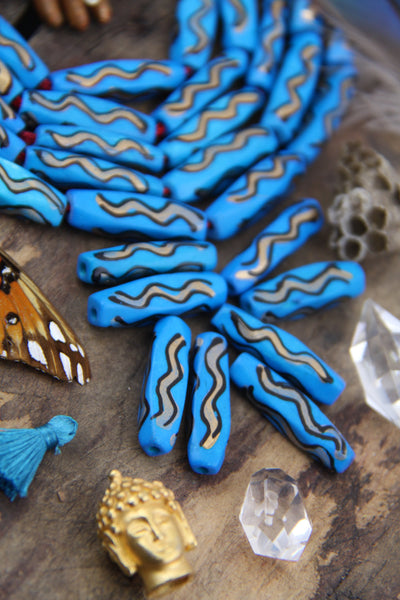 Blue Squiggle Barrel: Hand Painted Bone Beads, 7x27mm, 8 pieces - ShopWomanShopsWorld.com. Bone Beads, Tassels, Pom Poms, African Beads.