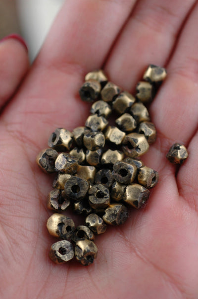 African Brass Hex Nut Beads 6x5mm, 10 loose beads - ShopWomanShopsWorld.com. Bone Beads, Tassels, Pom Poms, African Beads.