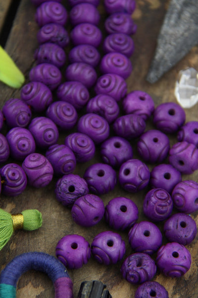 Purple Tribal Bullseye: Handmade Bone Beads, 10x14mm, 20 pieces - ShopWomanShopsWorld.com. Bone Beads, Tassels, Pom Poms, African Beads.
