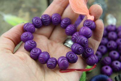 Purple Tribal Bullseye: Handmade Bone Beads, 10x14mm, 20 pieces - ShopWomanShopsWorld.com. Bone Beads, Tassels, Pom Poms, African Beads.