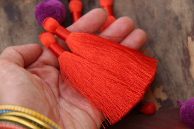 Aurora Red Pantone Silky Luxe Tassels, 3.5", 2 Pieces - ShopWomanShopsWorld.com. Bone Beads, Tassels, Pom Poms, African Beads.