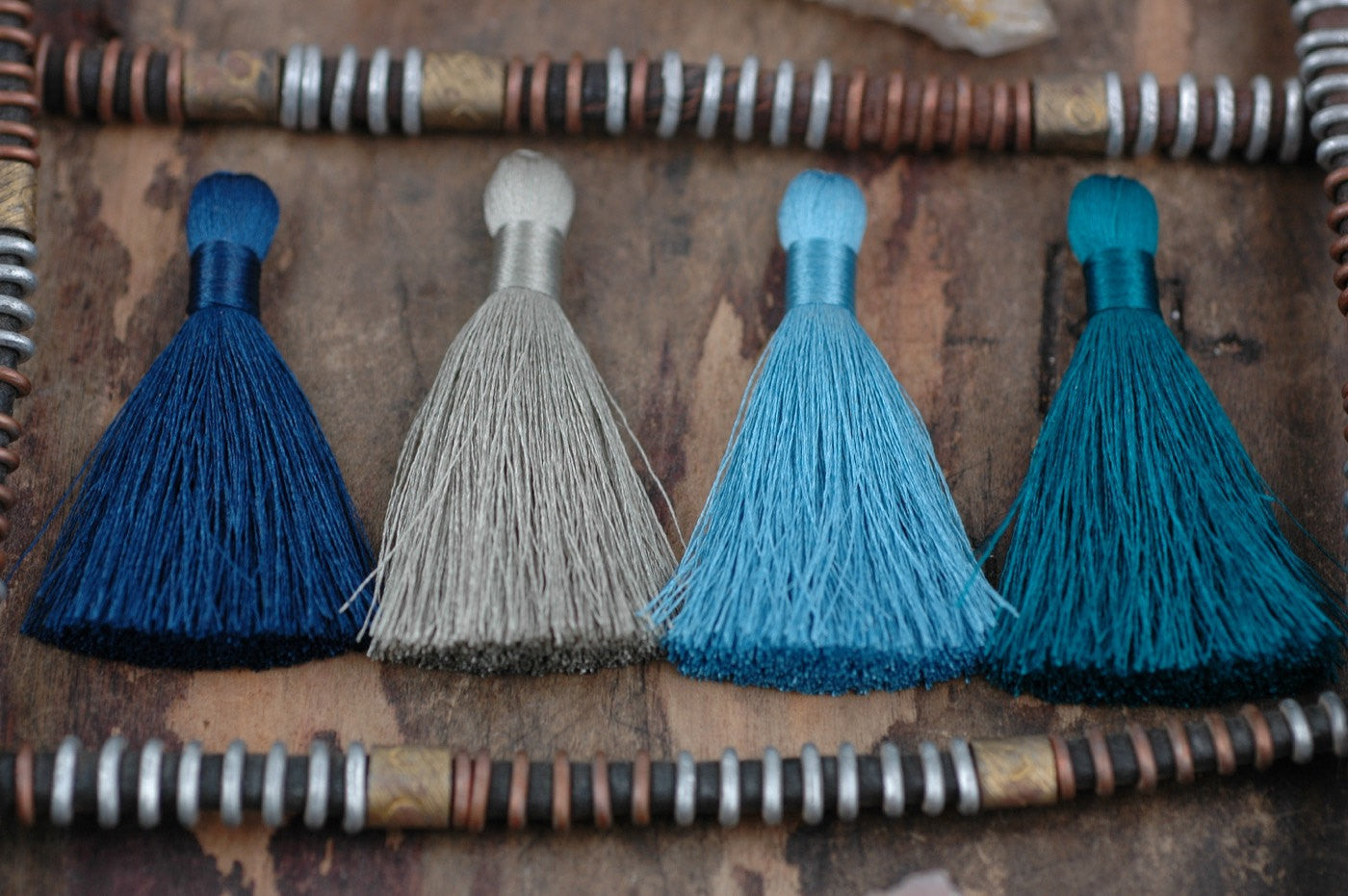Tranquil Waters, 2" Silky Tassel Mixed Pack, 4 pieces - ShopWomanShopsWorld.com. Bone Beads, Tassels, Pom Poms, African Beads.