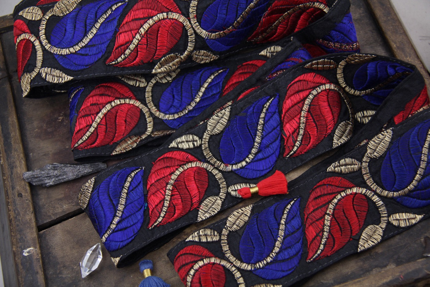 Regal Vines at Midnight: Black with Red, Blue, Gold leaves, Sari Border from India 2 1/2" x 1 yard, Ornate Winter Sewing Decorating Supply - ShopWomanShopsWorld.com. Bone Beads, Tassels, Pom Poms, African Beads.