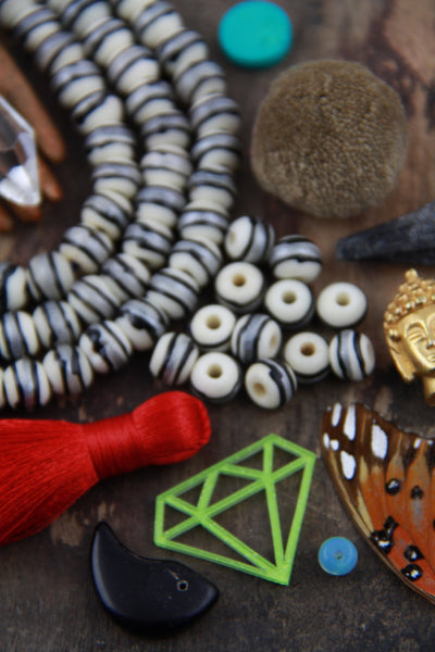 Cream Orbit Rondelle Bone Beads : Cream, Silver & Black Painted, 8x7mm, Natural Craft, Jewelry Making Supplies, Beads For Mala's, 28 pcs - ShopWomanShopsWorld.com. Bone Beads, Tassels, Pom Poms, African Beads.