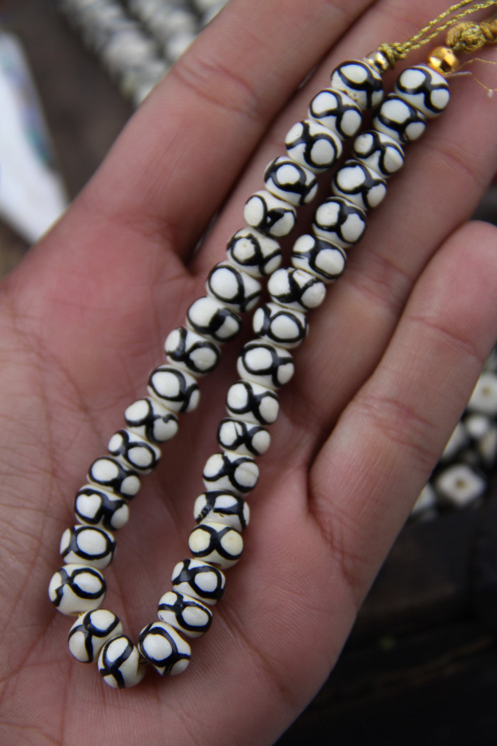 White & Black Infinity Circles: Handmade Bone Beads, 8x6mm, 30 Pieces - ShopWomanShopsWorld.com. Bone Beads, Tassels, Pom Poms, African Beads.