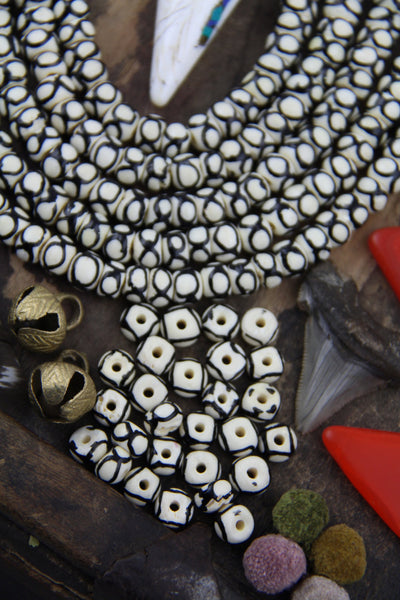White & Black Infinity Circles: Handmade Bone Beads, 8x6mm, 30 Pieces - ShopWomanShopsWorld.com. Bone Beads, Tassels, Pom Poms, African Beads.