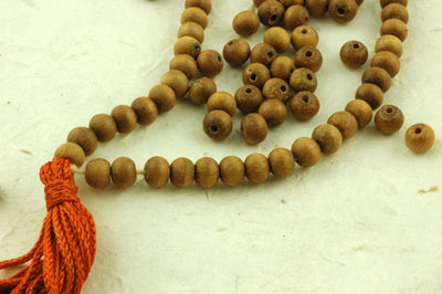 6mm Sandalwood, 108 Aromatic Bead Mala - ShopWomanShopsWorld.com. Bone Beads, Tassels, Pom Poms, African Beads.