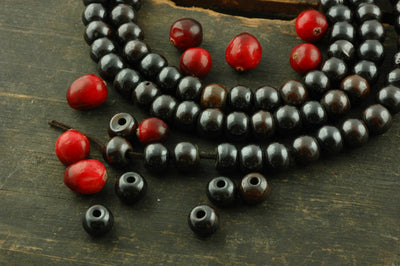 Sparkle: High Polish Blackish Brown Bone, 10x8mm, 108 Bead Mala - ShopWomanShopsWorld.com. Bone Beads, Tassels, Pom Poms, African Beads.