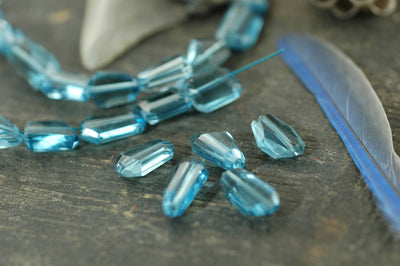 Blue Ice: London Blue Topaz Faceted Nugget Beads,1 bead, 6x10mm - ShopWomanShopsWorld.com. Bone Beads, Tassels, Pom Poms, African Beads.